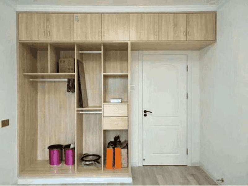 Custom panel wardrobe built along a wall